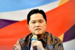 Menpora Erick Thohir tegaskan Indonesia patuhi UUD 1945 meski IOC hentikan kejuaraan.