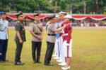 Kapolri Jenderal Listyo Sigit Prabowo dan Panglima TNI Jenderal Agus Subiyanto saat memimpin upacara wisuda taruna di Lapangan Sapta Marga Akmil, Magelang.