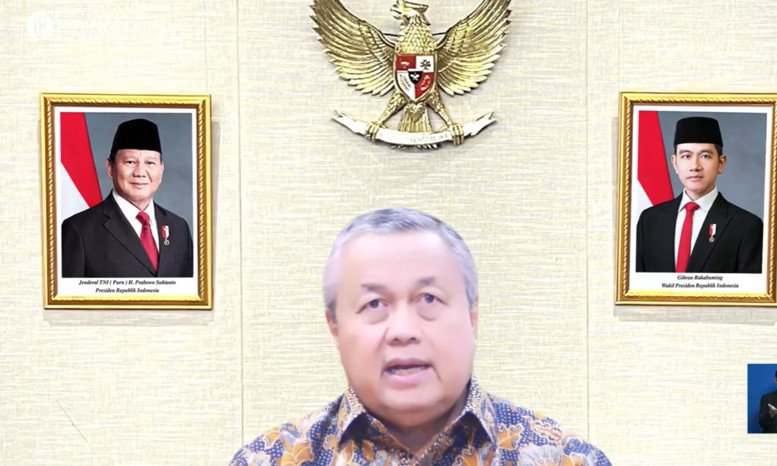 Tangkapan layar konferensi pers daring Gubernur Bank Indonesia Perry Warjiyo saat menjelaskan perkembangan suku bunga dan kebijakan moneter terkini.