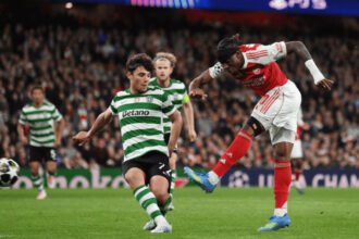 Arsenal memastikan tiket semifinal Liga Champions usai menahan imbang Sporting tanpa gol di Emirates.