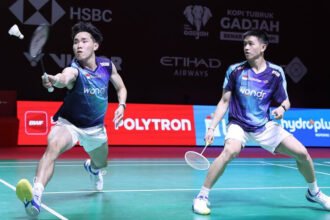 Raymond Indra dan Nikolaus Joaquin tampil dominan saat mengalahkan pasangan Jepang Kakeru Kumagai/Hiroki Nishi dua gim langsung untuk memastikan tempat di babak 16 besar Indonesia Open 2026.
