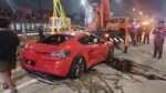 Viral Kecelakaan Porsche Merah di Depok: Hindari Genangan Jalan Licin, Ringsek Nyungsep ke Parit