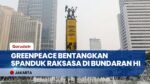 Greenpeace Bentangkan Spanduk Raksasa di Bundaran HI, Soroti Krisis Iklim