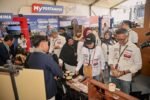 Puluhan UMKM binaan Pertamina memanfaatkan ajang MotoGP Mandalika 2026 untuk memperkenalkan produk lokal dan memperluas peluang bisnis.